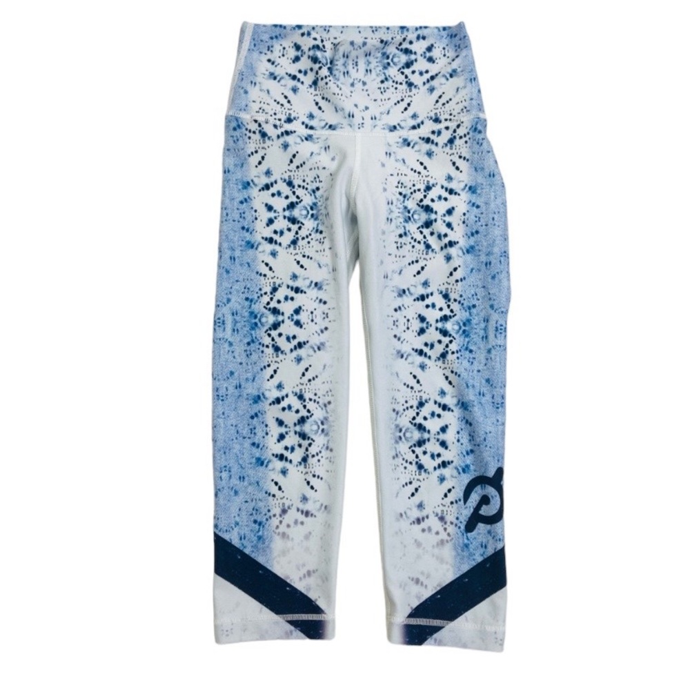 Peloton With workout gym running blue tie dye leggings.
